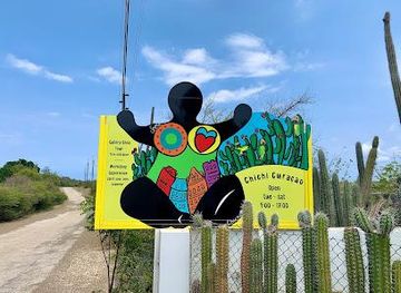 curacao/julianadorp/attraction/serena-s-art-factory-chichi-garden