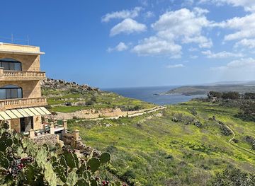 malta/hondoq-bay/attraction/panoramic-view-towards-comino-island