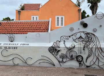 curacao/mambo-beach/attraction/emancipate-yourself-from-mental-slavery-artwork