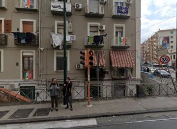 italy/naples/attraction/residential-building-with-napoli-football-club-team-portraits