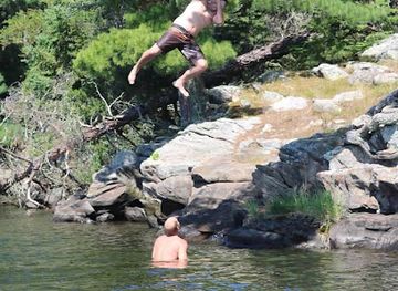 minnesota/voyageurs-national-park/attraction/echo-island-rope-swing-voyageurs-national-park