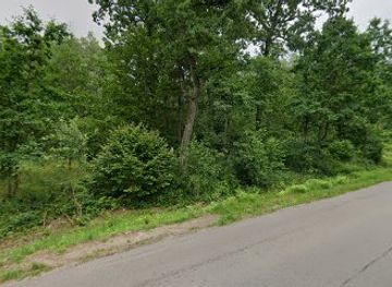 poland/podlachia/attraction/mezczyzna-z-rowerem