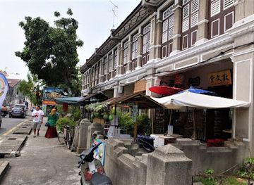 malaysia/george-town/attraction/penang-street-art-boy-on-chair
