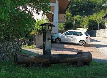 germany/zugspitze/attraction/alpine-baumstammbrunnen-grainau