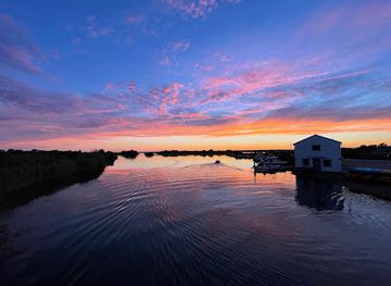 rhode-island/trustom-pond-national-wildlife-refuge/attraction/ninigret-pond-sunset-view