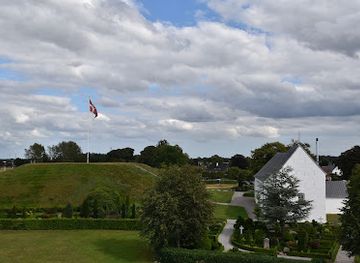 denmark/vejle/attraction/jelling-mounds-runic-stones-and-church