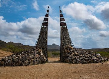 curacao/playa-kenepa/attraction/man-di-dios