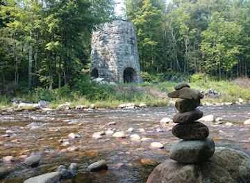 new-hampshire/franconia-notch-state-park/attraction/besaw-iron-furnace-interpretive-center