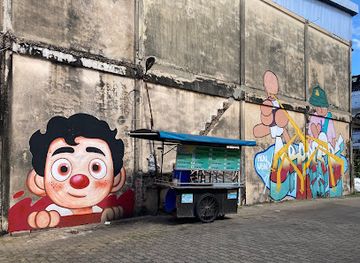 thailand/ubon-ratchathani/attraction/ubon-street-art-red-nose-boy