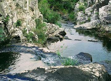 uruguay/quebrada-de-los-cuervos/attraction/treinta-y-tres-cartel