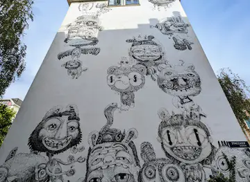 Mural by Nouch in Spinozahof
