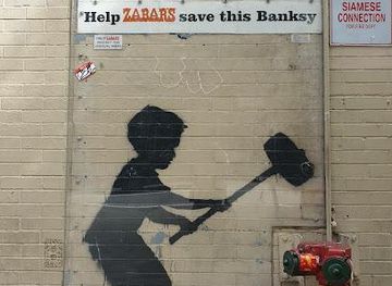 new-jersey/hackensack-meadowlands/attraction/banksy-hammer-boy-mural