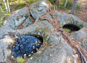 finland/espoo/attraction/sorlampi-giant-s-cauldrons