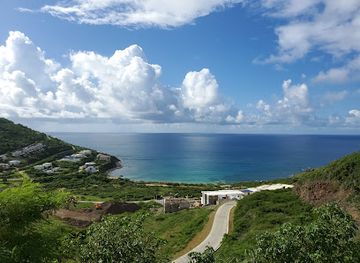 sint-maarten/le-galion-beach/attraction/man-on-chair-statue