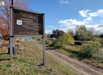 michigan/porcupine-mountains-wilderness-state-park/attraction/us-45-1300-mile-long-sign