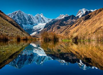 peru/huayhuash-circuit/attraction/peruvian-mountains-trek-climb