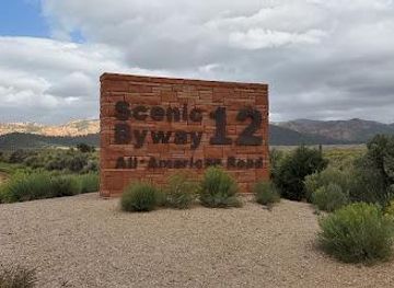 utah/bryce-canyon-city/attraction/scenic-byway-12-all-american-road-sign