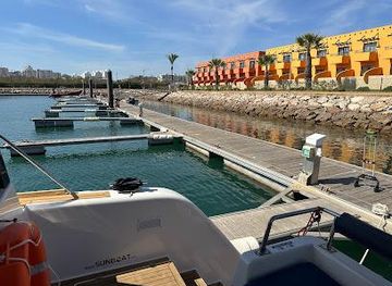 portugal/alentejo-coast/attraction/algarve-sunboat-benagil-cave-boat-tour-suncat-boarding-pier