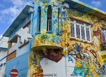 curacao/playa-manzalina/attraction/three-o-clock-romance-mural