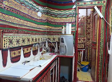 israel/rosh-hanikra/attraction/painted-home-shlomi