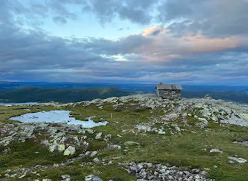 Skeikampen scenic view top point stone made cabin