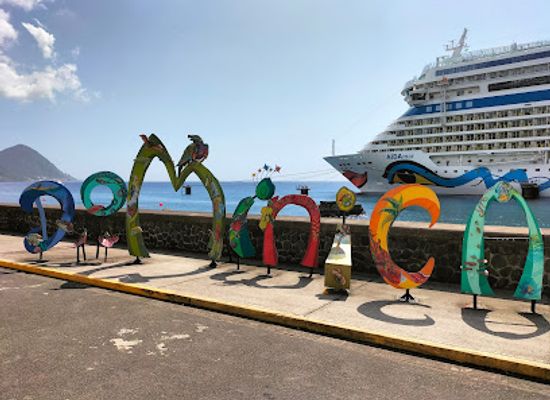 dominica/saint-andrew/attraction/dominica-sculpture-sign-photo-spot