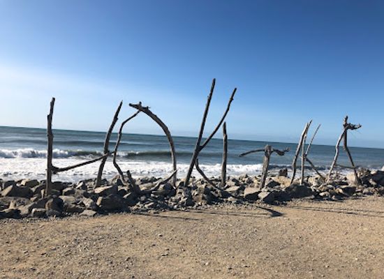 new-zealand/west-coast/attraction/hokitika-beach-sign