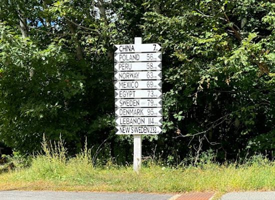 maine/washington-county/attraction/world-traveler-sign-post