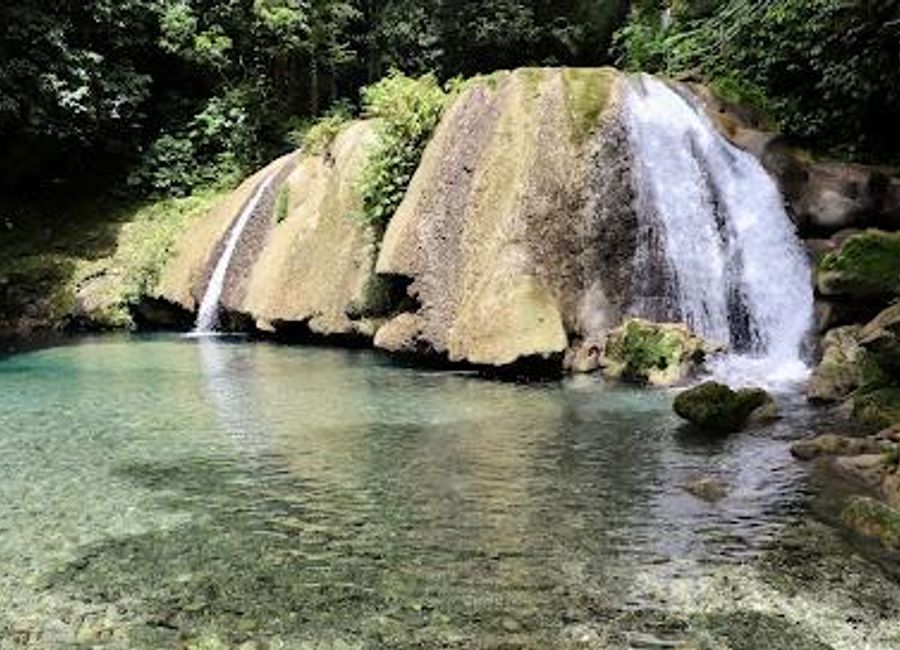 Discover the enchanting beauty of Reach Falls, a serene ecological park in Jamaica offering stunning waterfalls and lush landscapes for nature lovers.