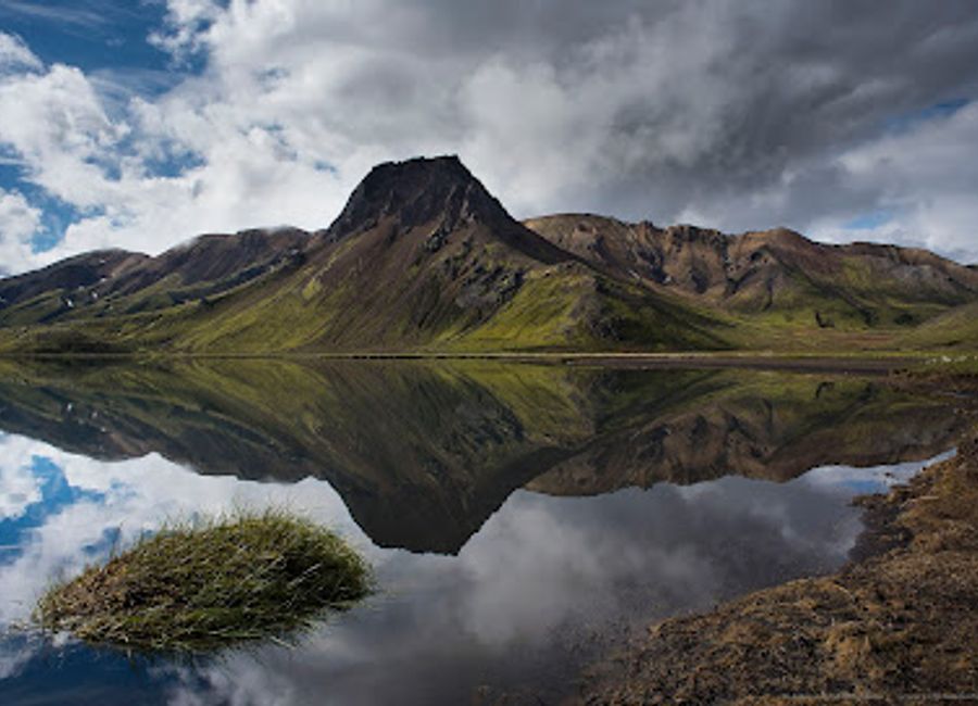 Discover the serene beauty of Kýlingavatn Lake, where Iceland's stunning landscapes and rich wildlife create an unforgettable retreat into nature.