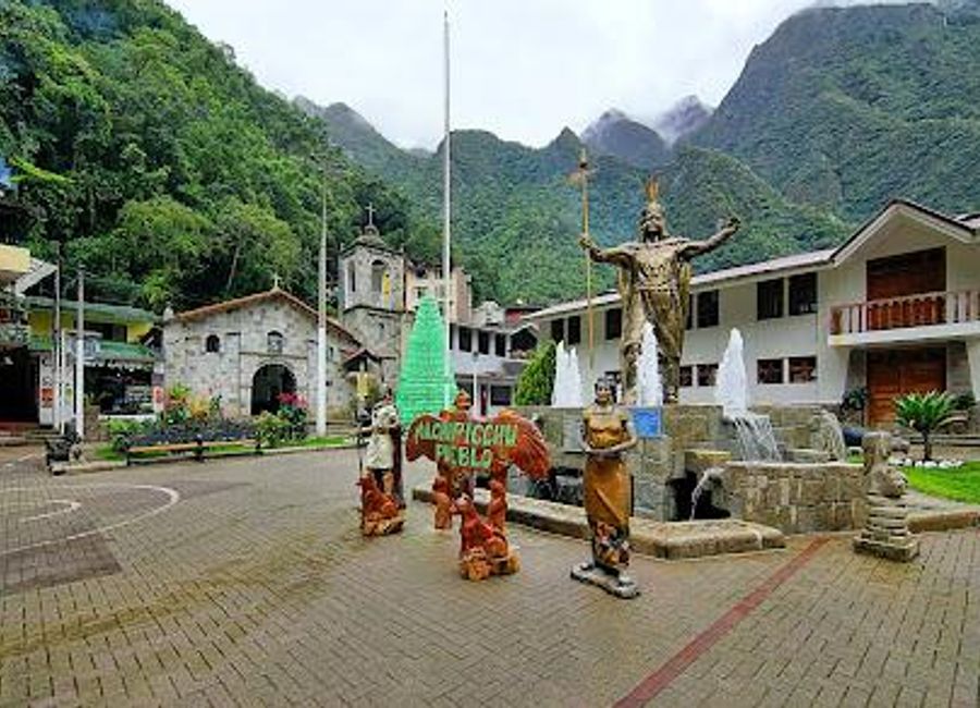Discover the tranquility and cultural richness of Manco Capac Square, the vibrant heart of Aguas Calientes, surrounded by breathtaking natural beauty.