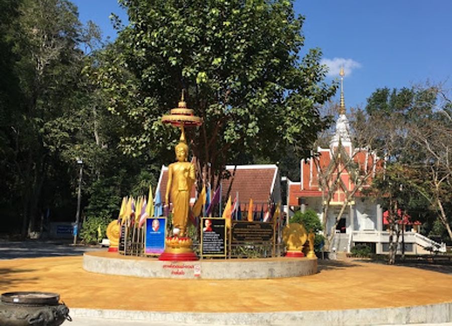 Explore the tranquil beauty of Wat Tham Pha Pu, a stunning Buddhist temple in Loei City, set against breathtaking natural landscapes.
