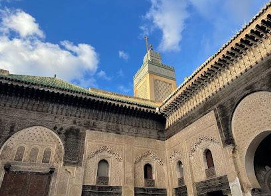 Explore the architectural beauty and cultural significance of Bou Inania Madrasa, an essential stop in the historic city of Fes, Morocco.