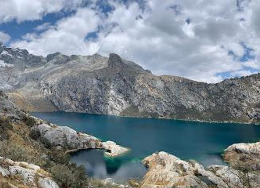 Explore the serene beauty of Churup Lake in the Peruvian Andes, a stunning destination for nature lovers and adventure seekers.