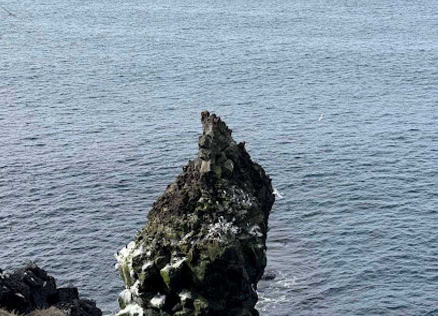 Explore the enchanting beauty of The Torch in Snæfellsbær, an iconic tourist attraction showcasing Iceland's natural wonders and rich cultural heritage.