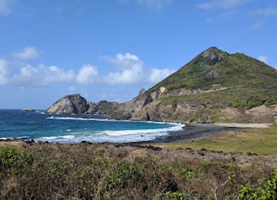 Hike to a natural aquarium in Fernando de Noronha, where you can snorkel amidst diverse marine life. Book your spot in advance!