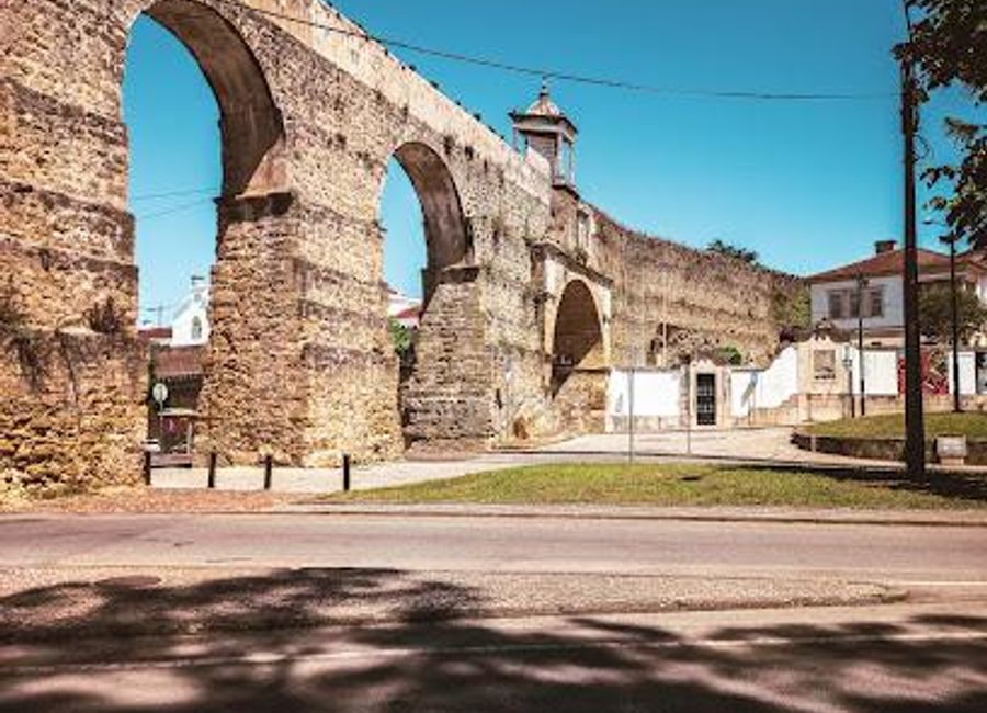 Explore the Aqueduto de São Sebastião in Coimbra, a stunning historical landmark showcasing impressive architecture and scenic views.