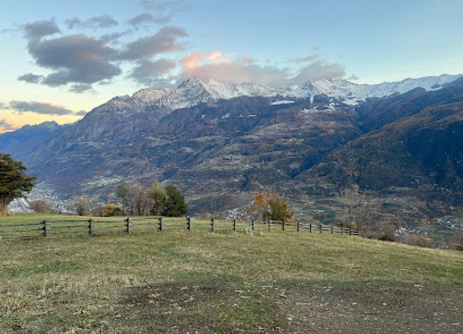Explore the natural beauty and rich heritage of Aosta Valley at Petit Poignon, a tranquil tourist attraction perfect for nature lovers.