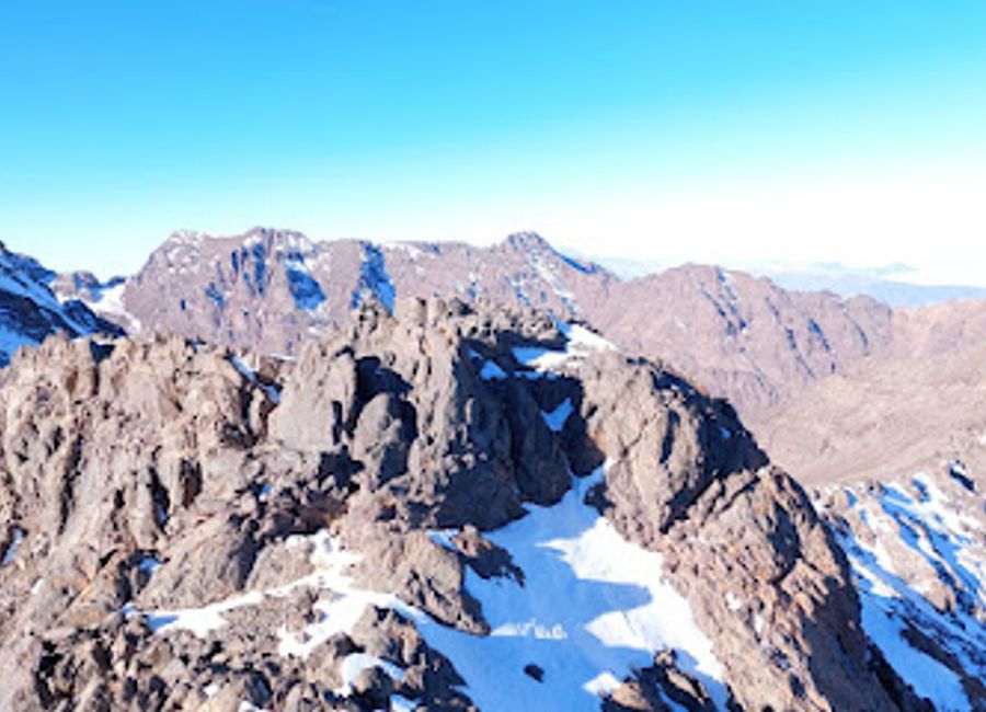 Discover the breathtaking Imouzzer Summit in the High Atlas Mountains, a serene retreat for nature lovers and adventure seekers alike.