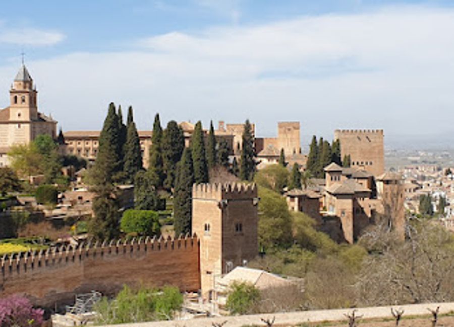 Explore the Alhambra, a stunning UNESCO World Heritage Site in Granada, renowned for its breathtaking architecture, lush gardens, and rich Moorish history.