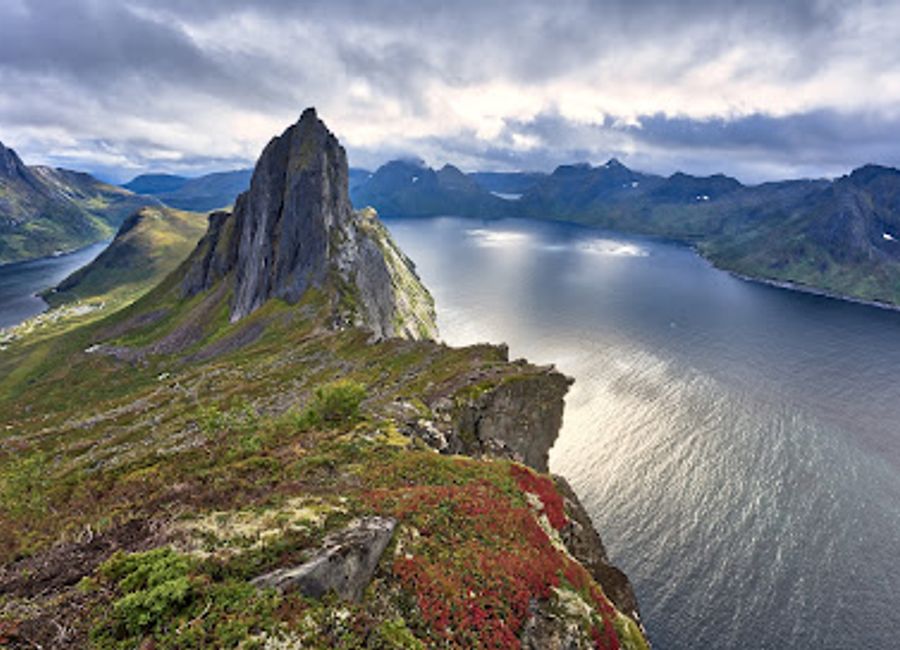 Discover the breathtaking beauty of Segla, an iconic mountain peak in Norway offering unforgettable hiking experiences and stunning vistas.