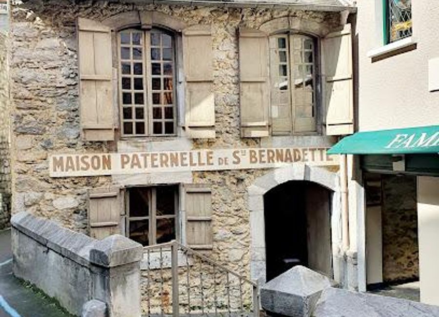 Explore the life and legacy of St. Bernadette at Maison Paternelle, a unique museum experience in Lourdes, France, combining history, spirituality, and culture.