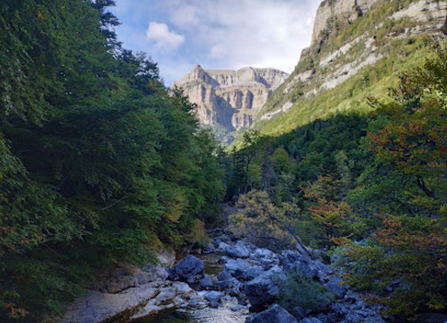 Experience the breathtaking beauty of Cascada de la Cueva in Torla-Ordesa, a stunning waterfall surrounded by lush landscapes and thrilling hiking trails.