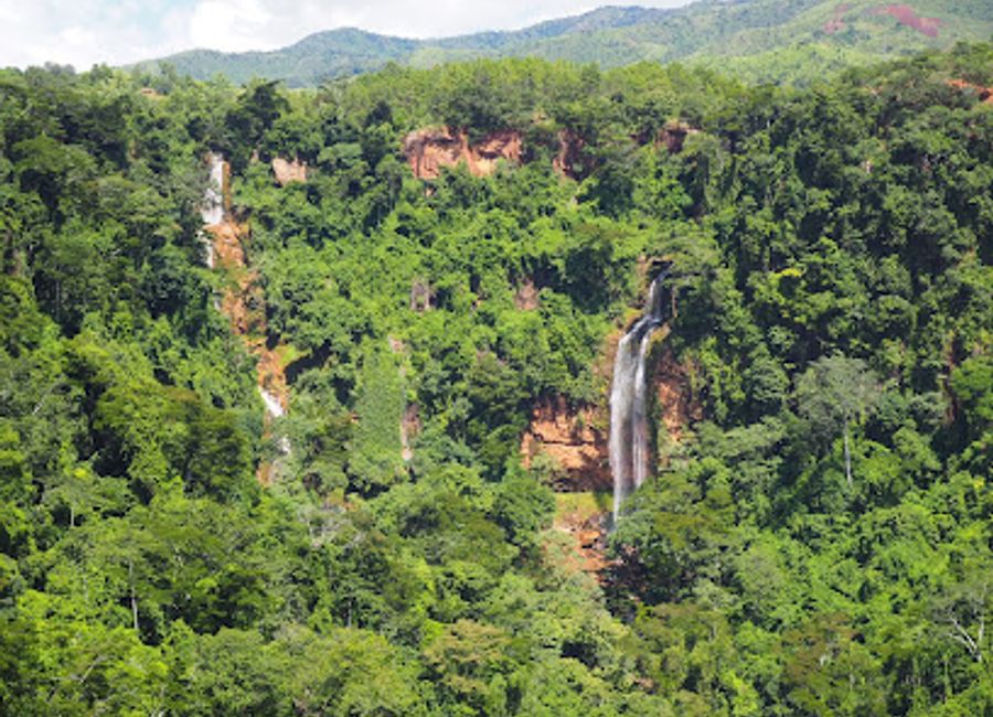 Experience the stunning beauty and tranquility of Manchewe Waterfalls, a hidden gem in Livingstonia, Malawi, perfect for nature lovers and adventure seekers.