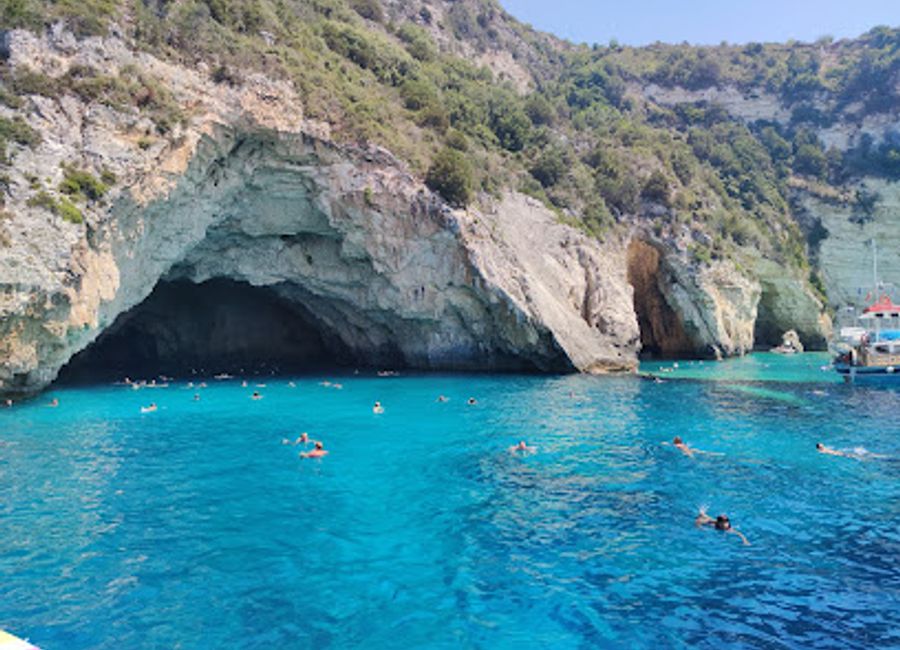 Experience the breathtaking beauty of Gallazies Spiliés in Paxi, Greece, where crystal-clear waters and stunning caves await nature lovers and adventurers alike.