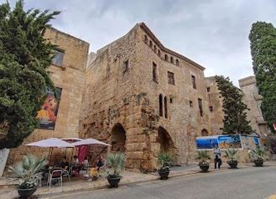 Experience the historical charm and vibrant culture of Tarragona at Plaça del Pallol, a captivating square perfect for leisurely exploration.