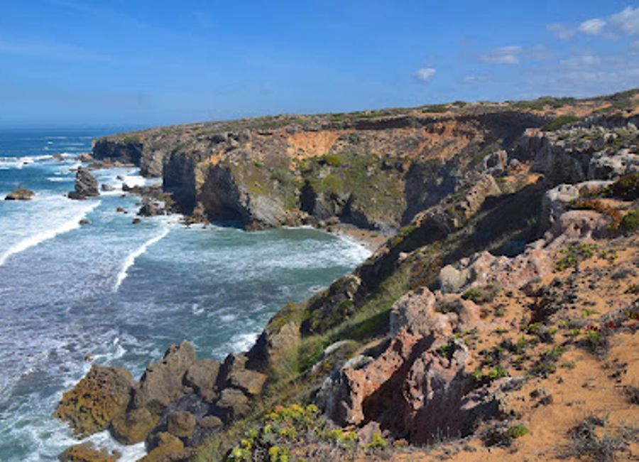 Experience the tranquil charm of Praia da Angra da Cerva, a hidden beach gem on Portugal's stunning Algarve coast, perfect for relaxation and exploration.