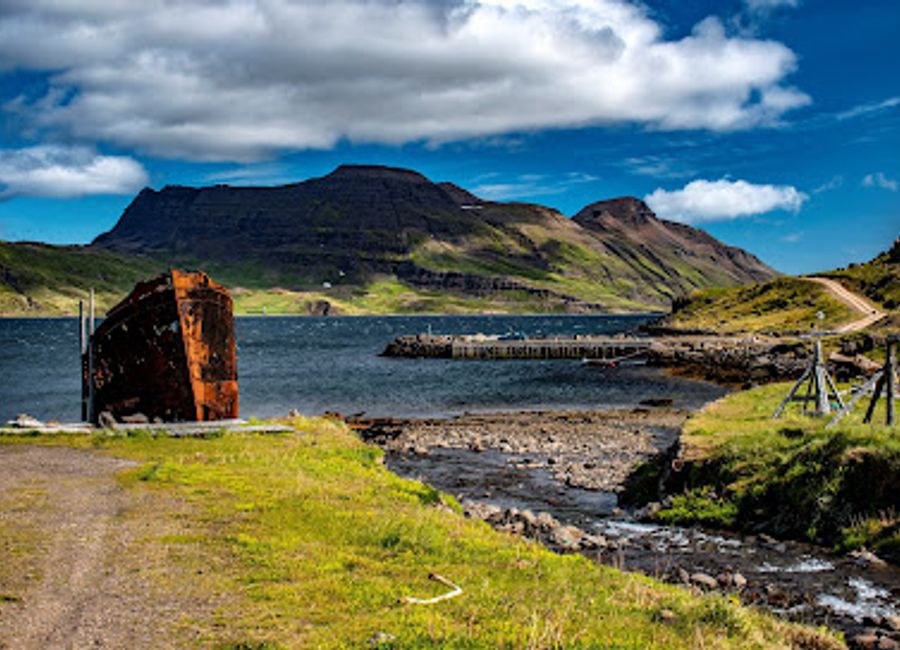 Discover the historic Djúpavík, where Iceland's fishing legacy comes to life in a stunning coastal setting, perfect for nature lovers and history buffs alike.