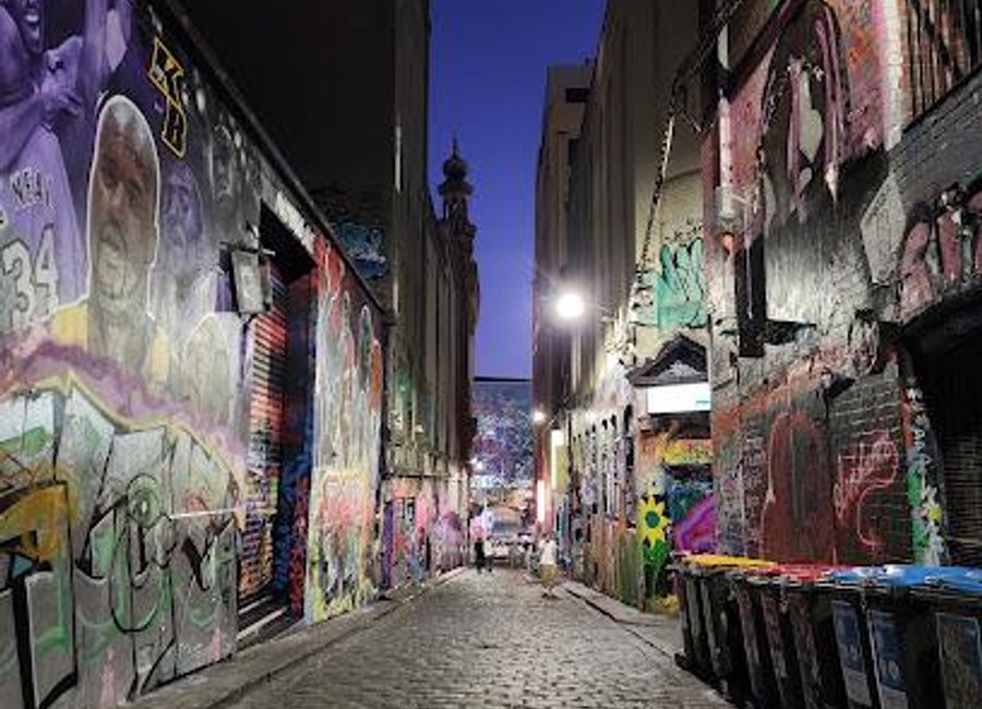 Explore Hosier Lane, Melbourne's vibrant street art hub featuring ever-changing murals and a lively cultural atmosphere.