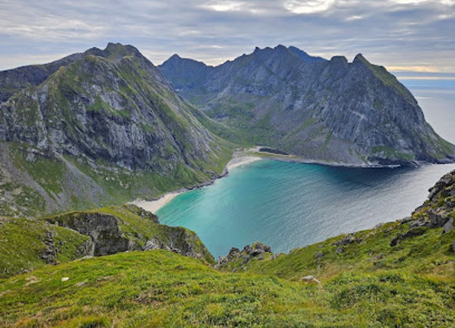 Experience the stunning vistas of Lofoten at Viewpoint Rock, a breathtaking attraction in Fredvang, Norway that will leave you in awe of nature's beauty.